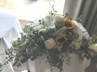 Let us craft you am eye catching sunflower arrangement for a Britol based wedding ceremony